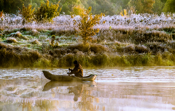 Рыбак на лодке. / Рыбак на лодке.