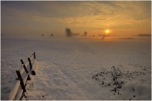Colors of the sunset in the winter. / The rising fog reflected what in the snow.