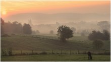 This morning. / A colorful foggy morning.