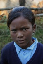 Настороженное / Гурунгская девочка в школьной форме. Непал 2012.
P.S. Долго и нагло выпрашивала шоколад.