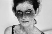Self Expression / This photograph represents a girl whose face is completely covered in freckles, this might seem as a sign of ugliness to some people, but I find beauty and nothing less in her!