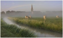 The village Oudekapelle in the morning. / A foggy summer morning.
