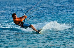 Surfing / Kite surfing in Eilat in the Gulf of the Red Sea at sunset