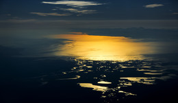 Байкал на закате / Закат над Байклом, р-н Нижнеангарска, высота 6000м.