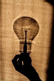 &nbsp; / A shadow of a Lightbulb