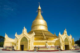Буддистский храм Maha Wizaya Pagoda крупным планом. Янгон, Мьянма / Буддистский храм Maha Wizaya Pagoda крупным планом солнечным днем. Янгон, Мьянма