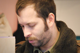 &nbsp; / Продавец в лавочке на Рождественском базаре