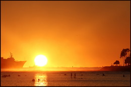 Закат / Закат солнца на пляже в Гонолулу