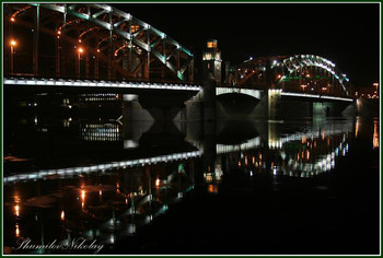 Вечерний этюд... / Реки и мосты. 
мост Петра Великого на Охте, он же Большеохтинский отраженный в Неве...