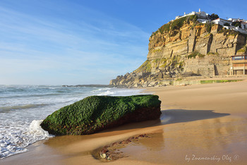 Atlantic Ocean coast and Azenhas do Mar village / Most beautiful iconic village in Portugal