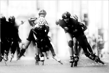 &nbsp; / the effort of young athletes to reach the finish line first in black and white