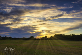 &nbsp; / Sonnenuntergang mit Sonnenstrahlen